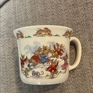 Bunnykins Hug a Mug Royal Daulton childs mug
Single handle sledding snowman